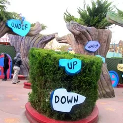 Alice's Curious Labyrinth pathways and signs at Disneyland Paris