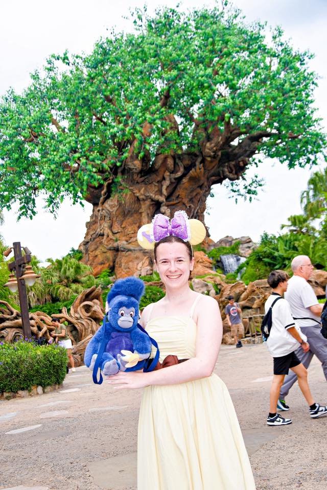 Guest Disneybounding as Jane from Tarzan with a plush gorilla at Animal Kingdom