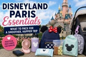 Family packing Disneyland Paris essentials including ponchos, portable charger, water bottle, snacks and stroller fan for a theme park day